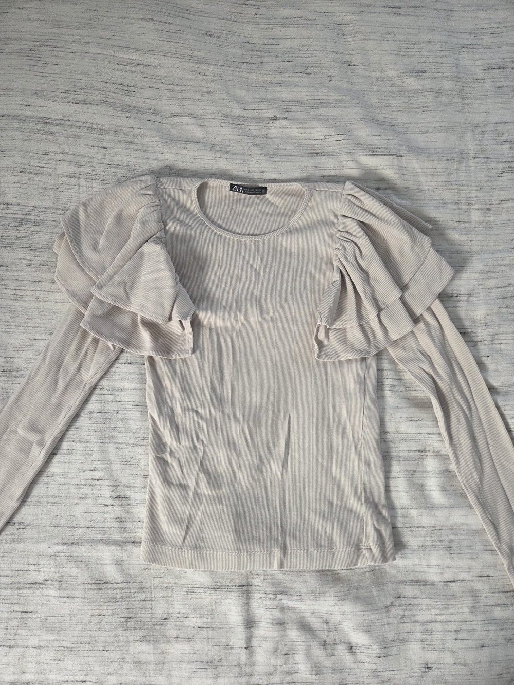 Zara Soft Cream Long-Sleeve Top with Layered Ruffle Shoulders